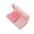 Pink plastic makeup brush cleaning soap box with clear lid and textured interior compartments for easy use