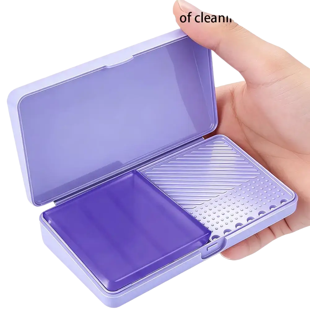 Purple plastic makeup brush cleaning soap box with divided interior featuring solid and ridged compartments for organization