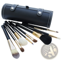Makeup brush set 10 piece gold and black with various bristles housed in a sleek black leather case