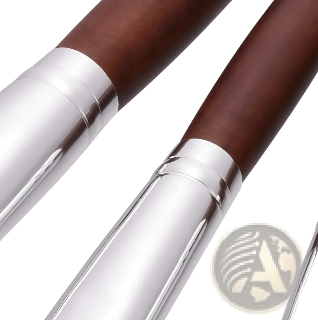 Brown wooden-handled pens with polished silver metallic barrels and matching bands from a makeup brush set 10 piece professional silver wood