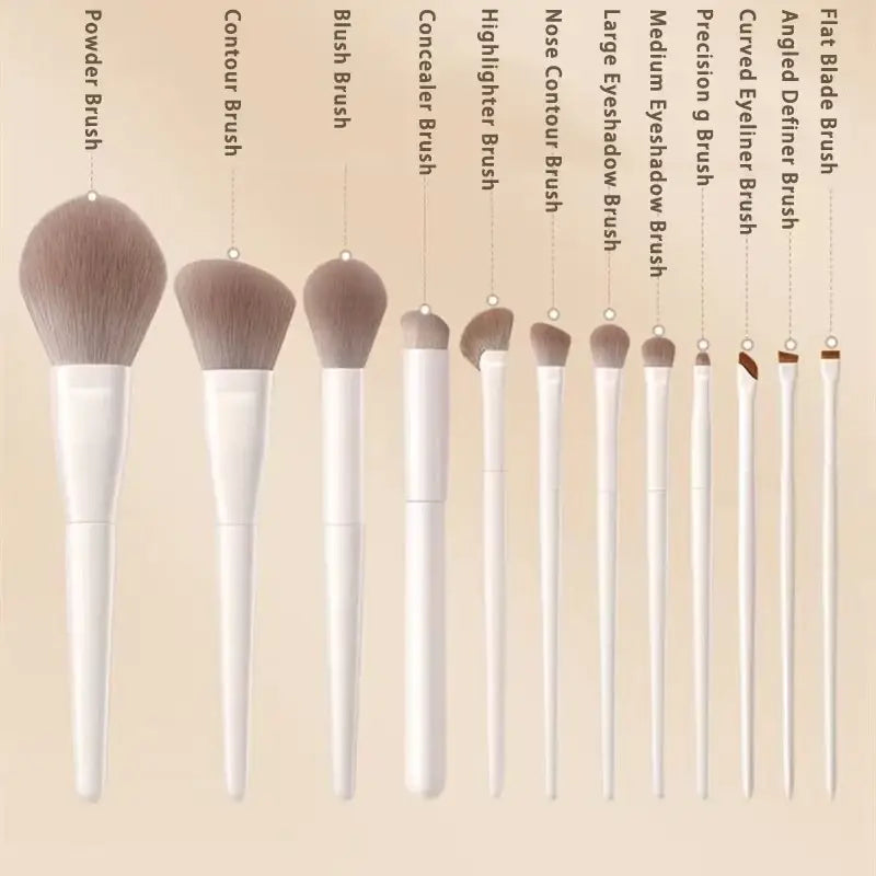 Makeup brush set with ten white handles and soft tapered bristles for diverse cosmetic applications