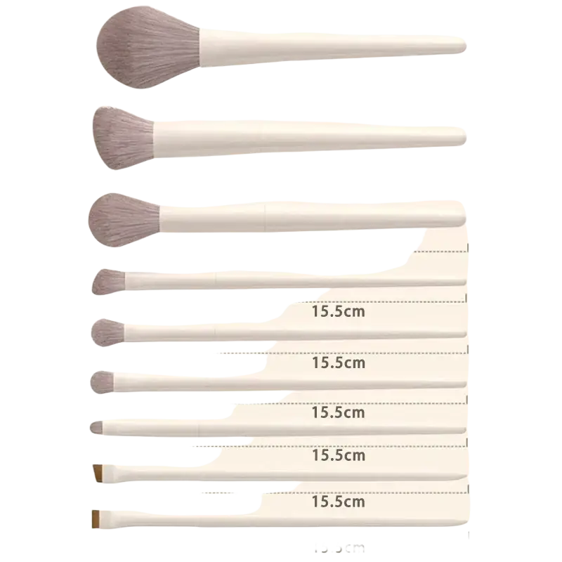 Set of ten white-handled makeup brushes with soft grayish-brown bristles for versatile cosmetic application