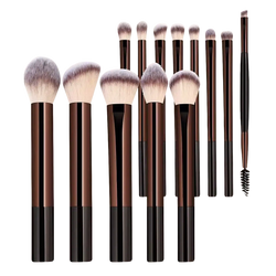 Set of 12 professional makeup brushes with sleek brown and black handles and soft gradient-tipped bristles