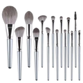 Set of 15 silver-finished professional synthetic makeup brushes with soft gray bristles in a makeup brush set