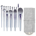 Makeup brush set with 15 silver pieces gray bristles and a matching gray suede case for professional use