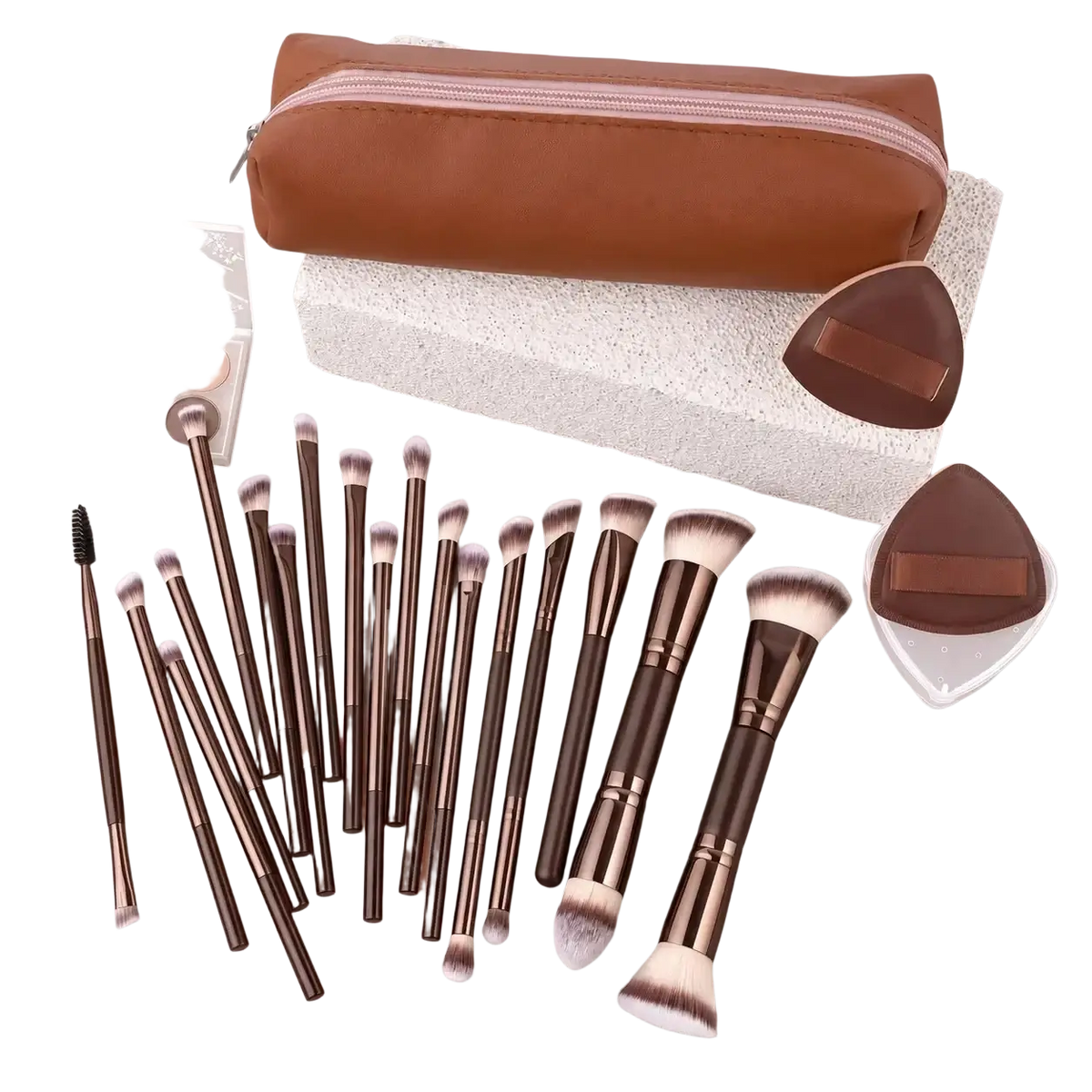 Brown leather makeup brush set with metallic accents and wool fiber white bristles in a travel case