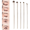 Set of five sleek white makeup brushes with varying shapes for precise eye makeup application travel kit