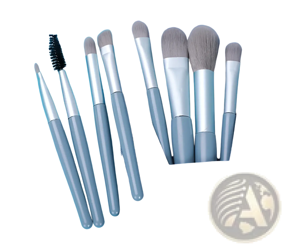 Makeup brush set with seven gray and silver brushes in a blue leather case for professional use