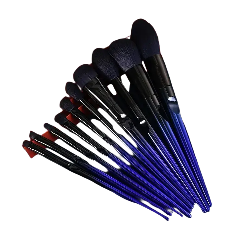 Set of ten gradient blue and black makeup brushes with soft dense bristles arranged in a fan-like display