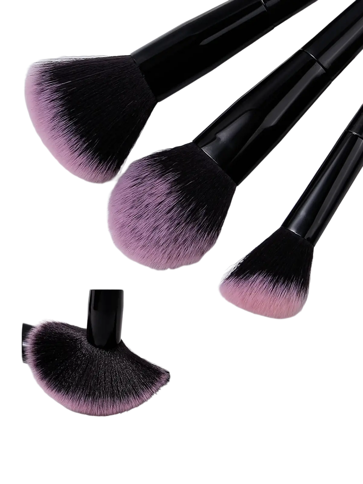 Set of three black-handled makeup brushes with fluffy gradient pink and black fiber bristles for precise application