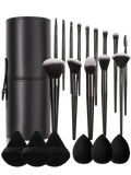 Black cylindrical leather makeup brush set with 21 soft bristle brushes and three teardrop sponge applicators with case