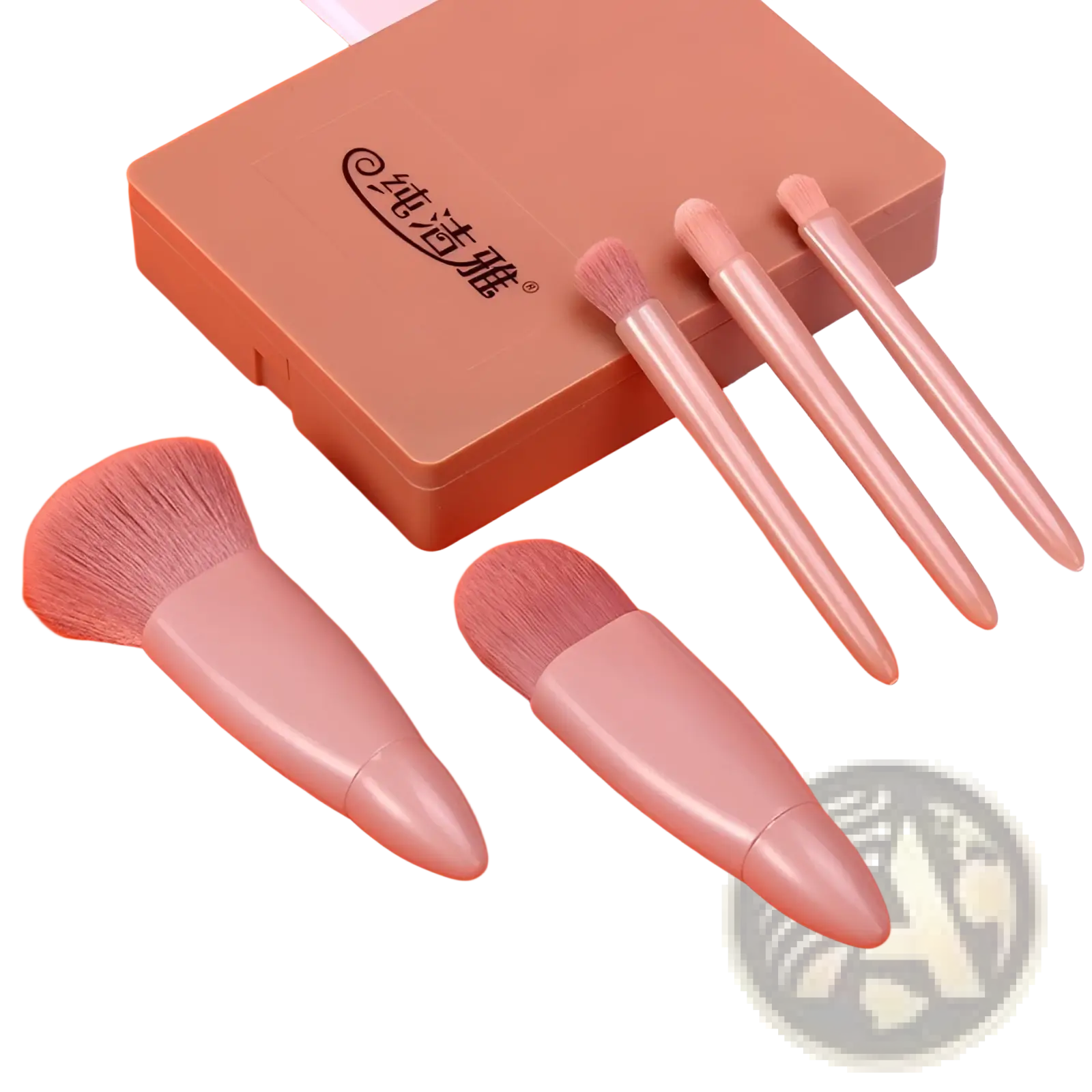 Set of four blush and contour makeup brushes with rose gold handles and soft pink bristles beside beige case