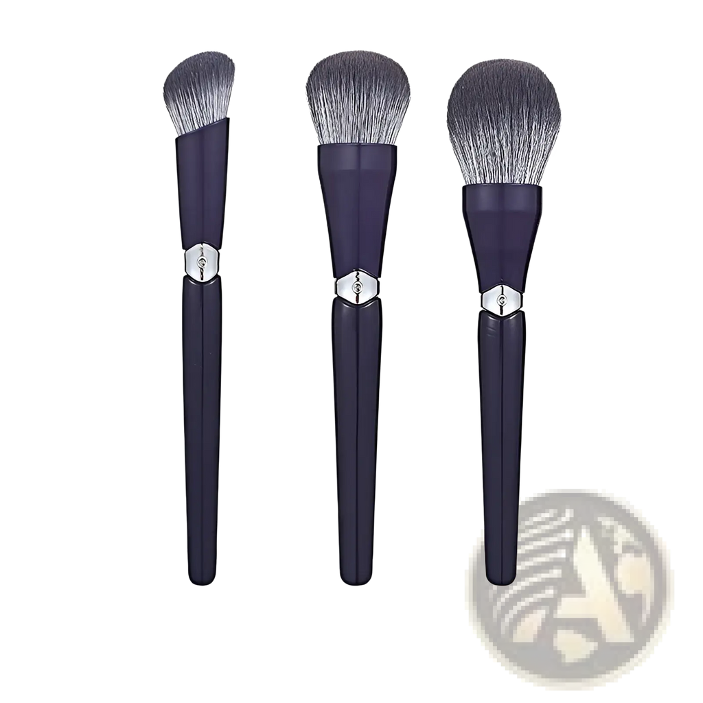 Set of three navy blue makeup brushes with silver accents and soft gradient gray bristles for face powder application