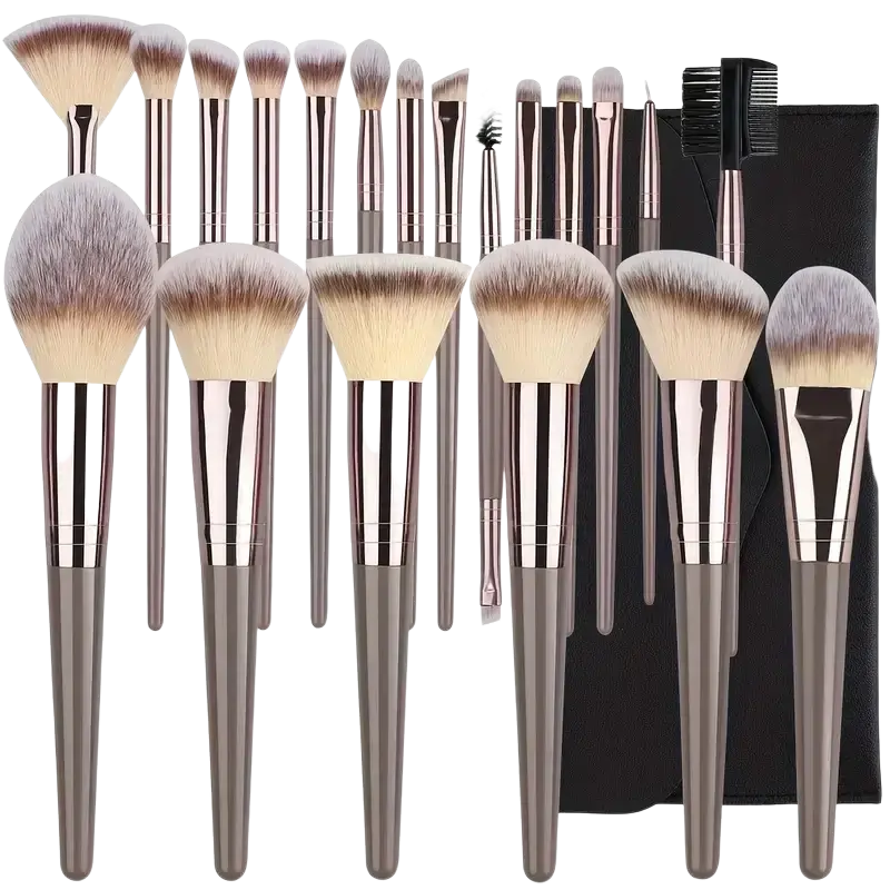 Set of 15 makeup brushes with gradient silver and rose gold handles and soft synthetic bristles for professional use