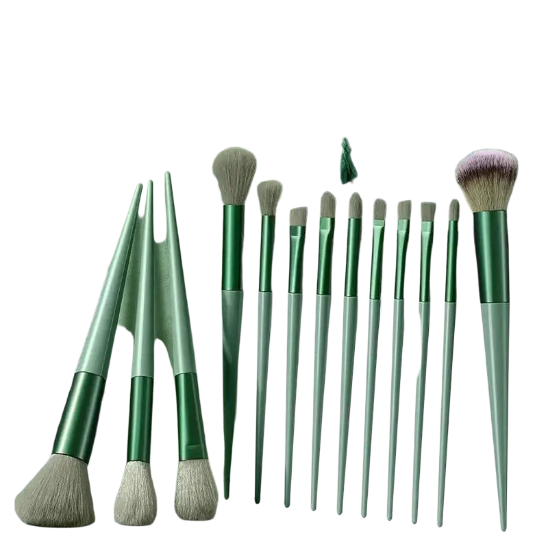 Set of green-handled synthetic fiber makeup brushes with soft bristles neatly arranged in a sage-green storage pouch