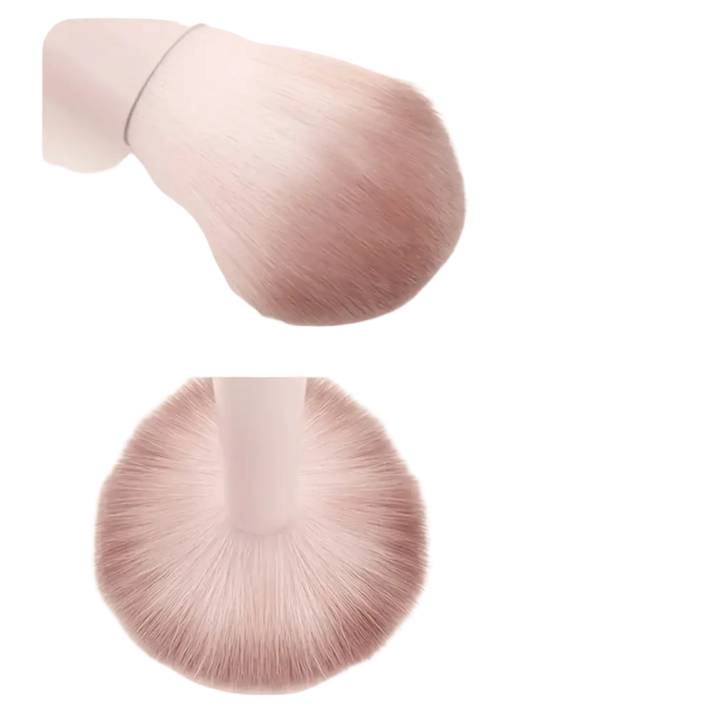 Soft pink wool fiber makeup brush with sleek white handle from a beginner makeup brush set kit