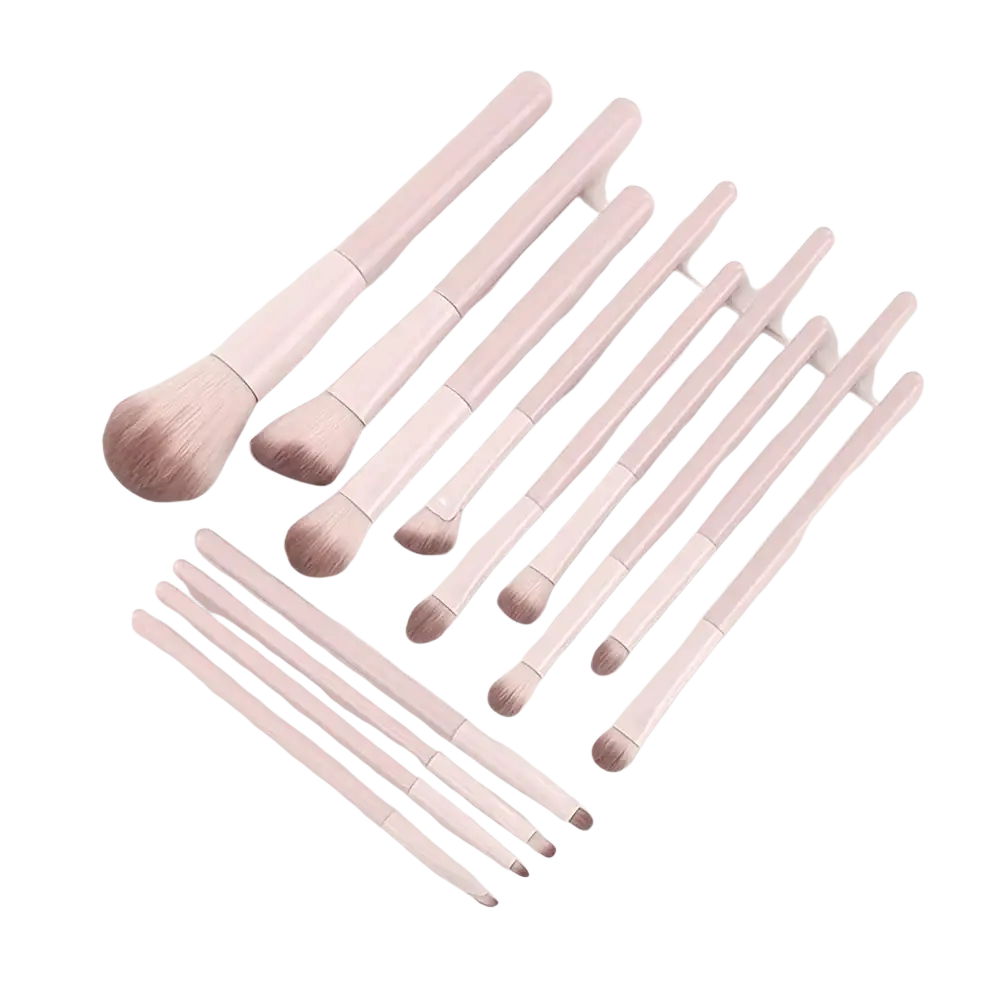 Set of ten pastel pink wool fiber makeup brushes with soft fluffy bristles in a beginner makeup brush set
