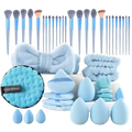 A 46 piece makeup brush and sponge set with light blue brushes, silver handles, and fluffy accessories for eye makeup application