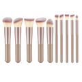 Set of ten professional makeup brushes with rose gold metallic handles and soft tapered bristles beauty cosmetics tools