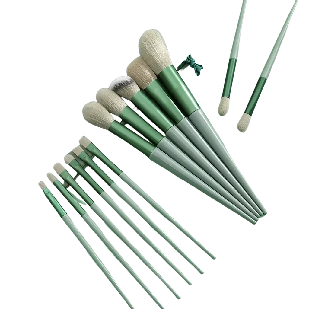 Set of twelve green and silver makeup brushes with soft tapered bristles for eye shadow and cosmetic brush use