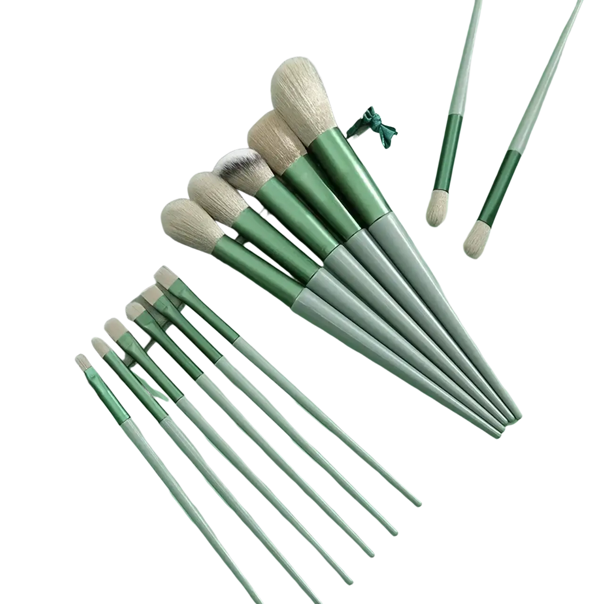 Set of twelve green and silver makeup brushes with soft tapered bristles for eye shadow and cosmetic brush use