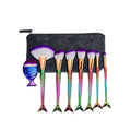 Makeup brushes set for teen girls with rainbow mermaid tail design, iridescent scales, purple-tipped bristles, and fish holder