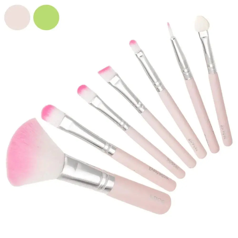 Set of seven pink and white gradient synthetic foundation and face brushes with silver ferrules for professional use