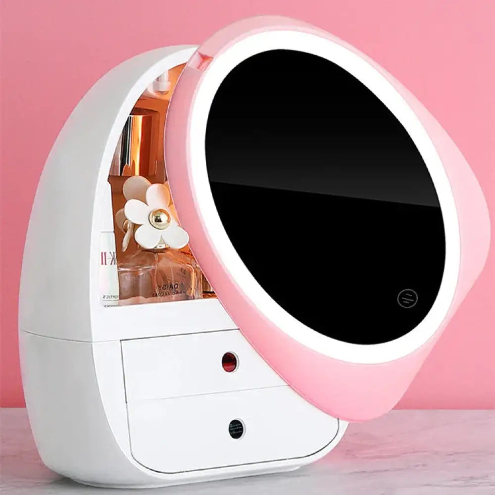 Pink and white oval led vanity mirror with hinged lid and illuminated interior storage for cosmetics and jewelry