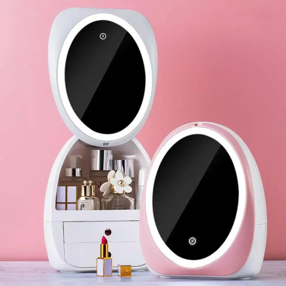 Led vanity mirror jewelry and makeup storage case in white and pink with oval shape and illuminated edges with storage compartment