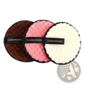 Makeup removing puff 3 pack with mesh bag featuring three circular clean sponges in brown pink and white with black trim