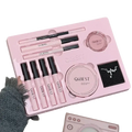 Pink qibest makeup sets featuring black-tipped pencils, blush compacts, and a silver necklace in molded tray