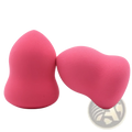 Two vibrant pink teardrop-shaped hydrophilic foam makeup sponges with soft porous texture in a 2 pack