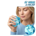 A translucent blue malt sugar stress relief squeeze toy cube filled with swirling snowflake shaped gel beads