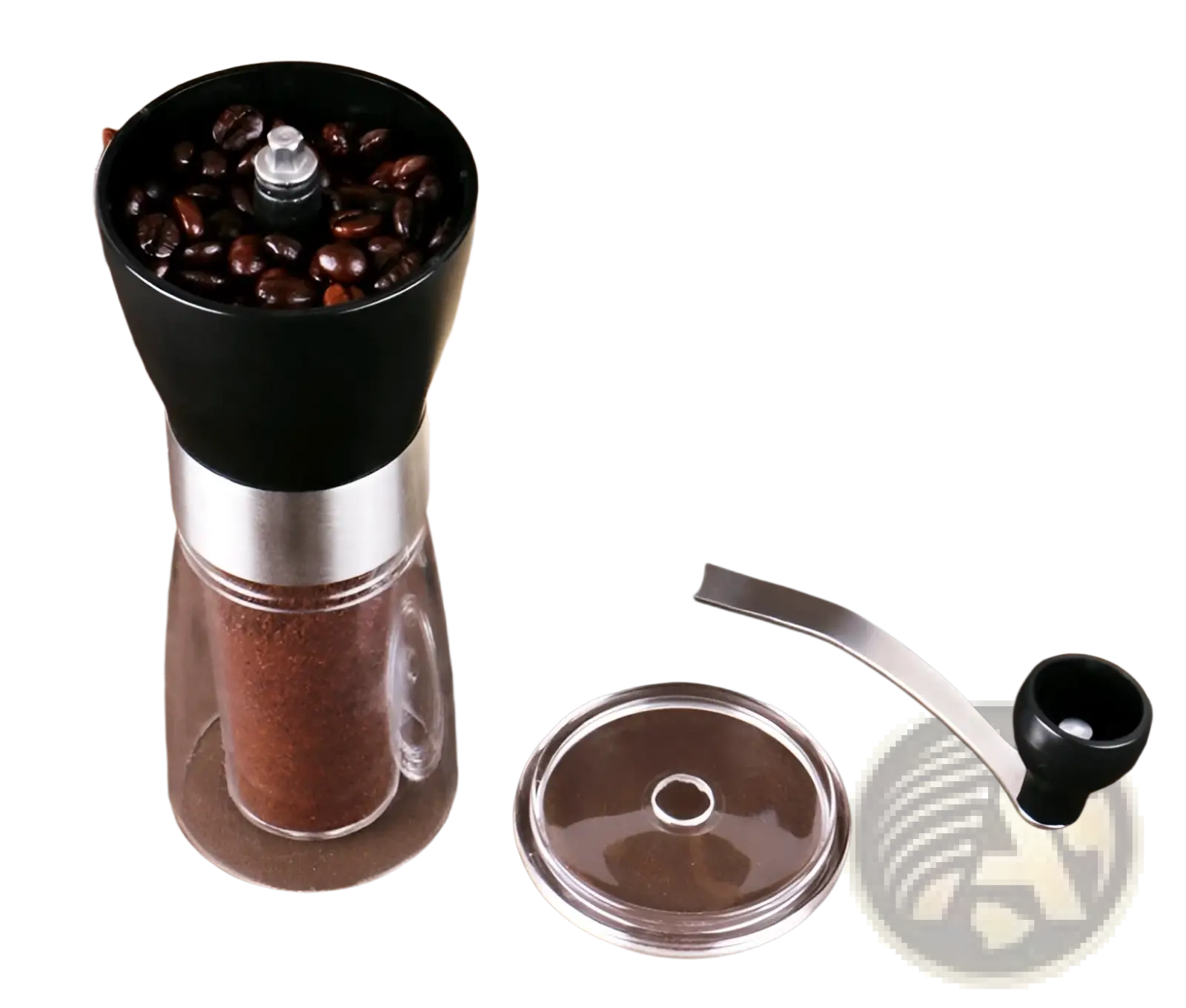 Black and stainless steel manual coffee grinder with clear glass base filled with ground coffee beans 6x17cm