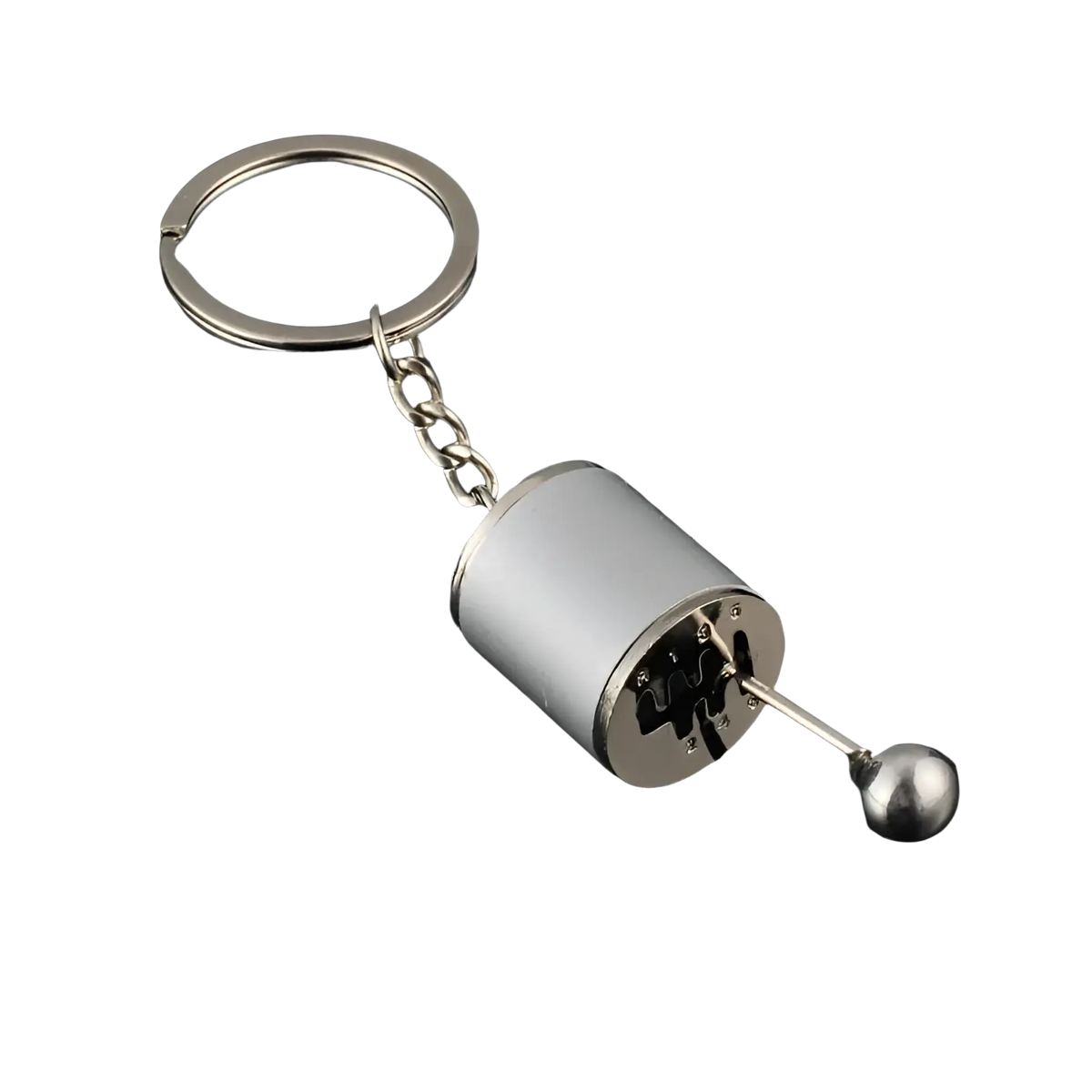 Silver metallic manual gear shift car keychain with polished chrome ball and engraved gear pattern on metal base