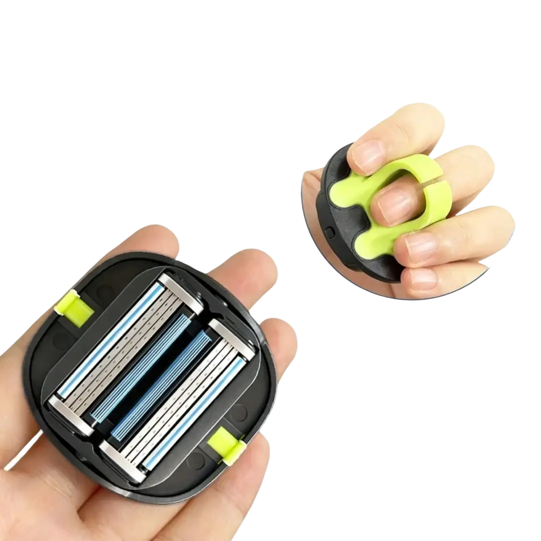 Compact manual grooming tool for head and body shave with black neon green handle and three razor blades in metallic housing