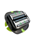 Green head shaver grooming tool with sleek black and lime green design and three precision razor blades for smooth shave