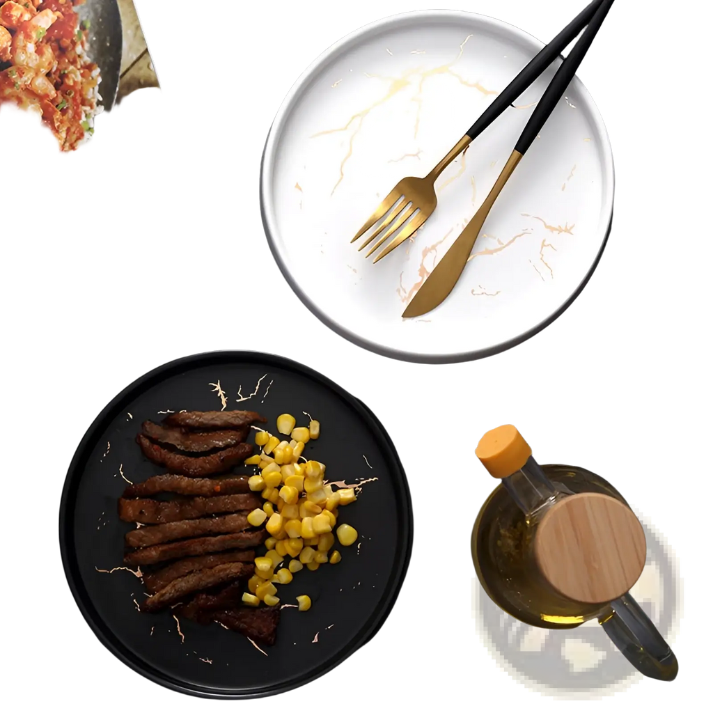 White marble-patterned ceramic plate with gold veining tray accompanied by black and gold cutlery for elegant dining
