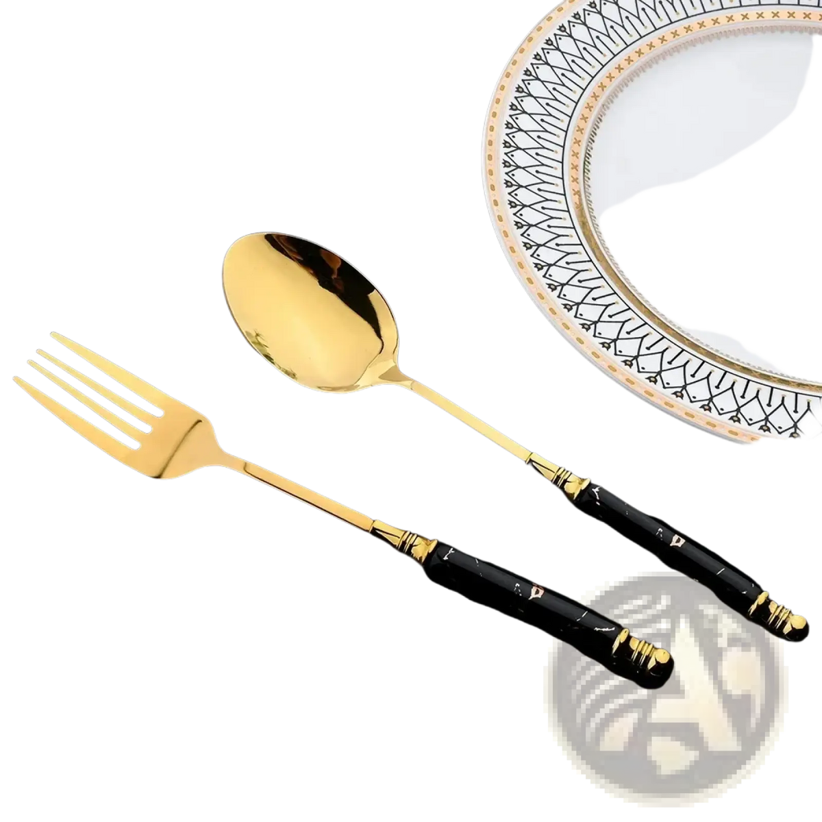 Gold-finished fork and spoon with black marble-patterned handles from the marble handle gold cutlery set 24-piece