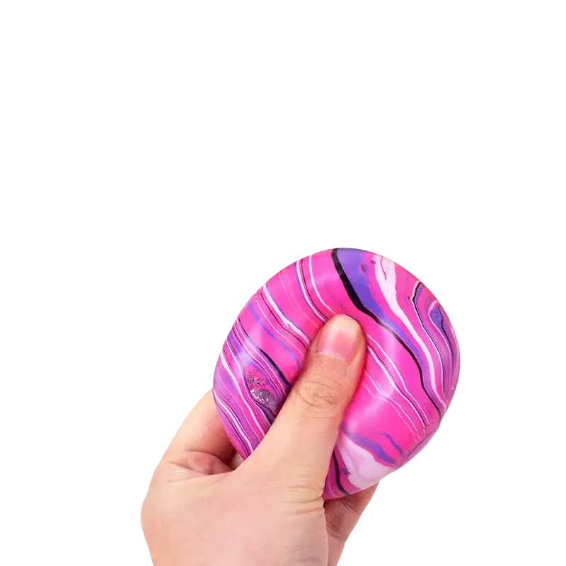 A hand holds a glossy pink purple and white marble swirl cube squeeze toy slow rising sensory fidget ball