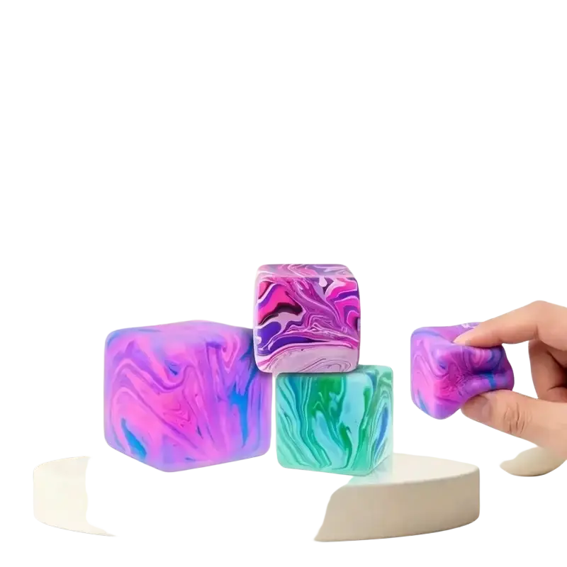 Vibrant marble swirl cube squeeze toy made of marbled silicone in purple and blue swirls for slow rising sensory fidget