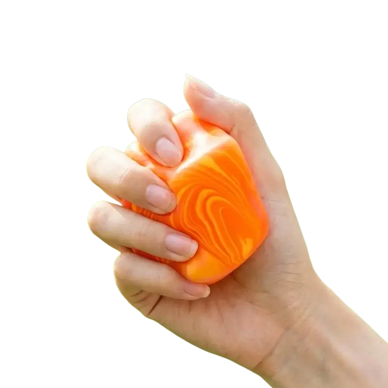 Vibrant orange and yellow marble swirl cube squeeze toy made of soft silicone for slow rising sensory fidget use