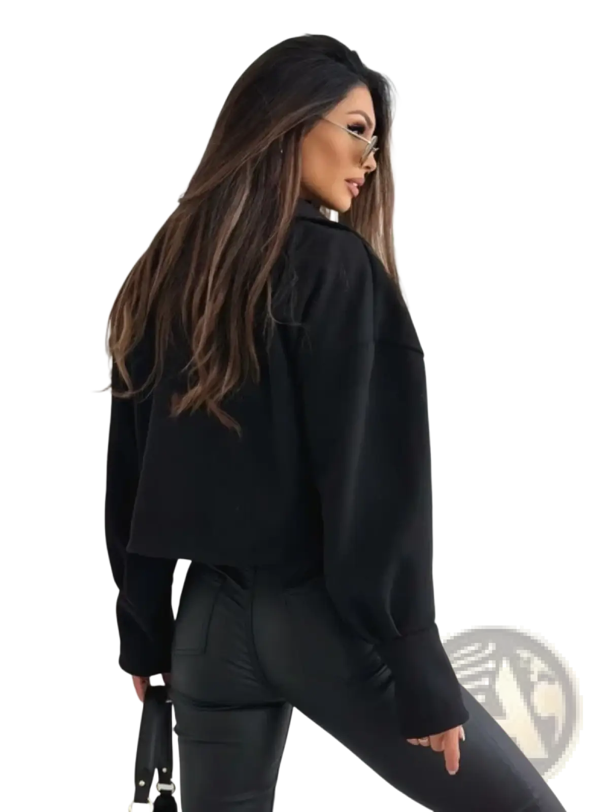 Black cropped long-sleeve blouse with relaxed fit and subtle texture shown as part of maroon cropped double breasted wool coat ensemble