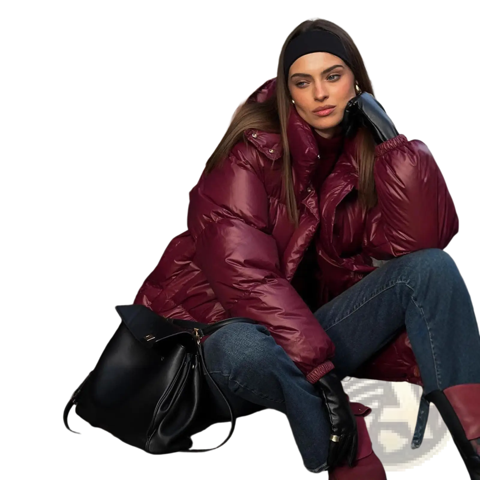 A glossy burgundy hooded puffer jacket with quilted design and shiny reflective material for cold weather