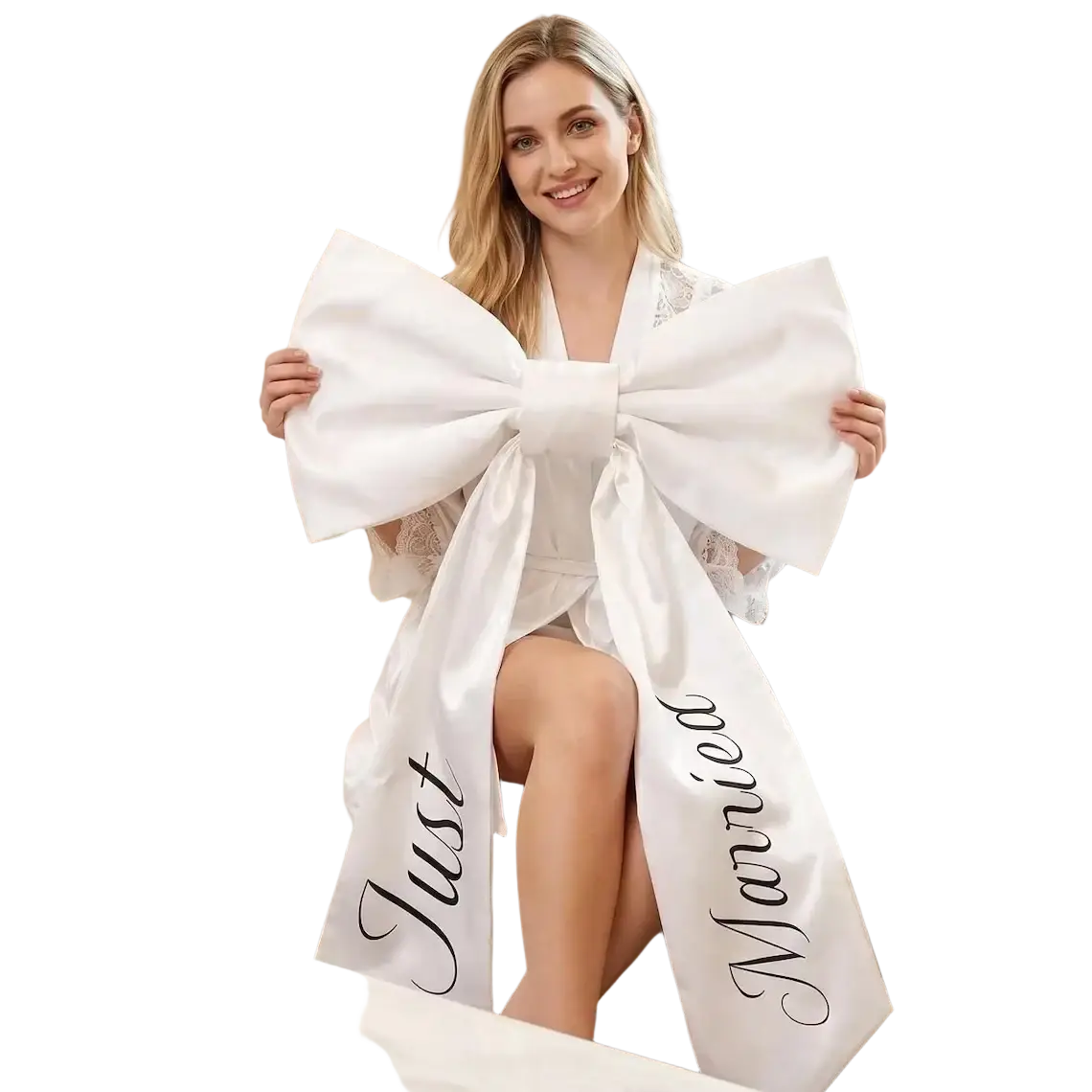 A large white satin just married car bow with black cursive script for wedding decoration