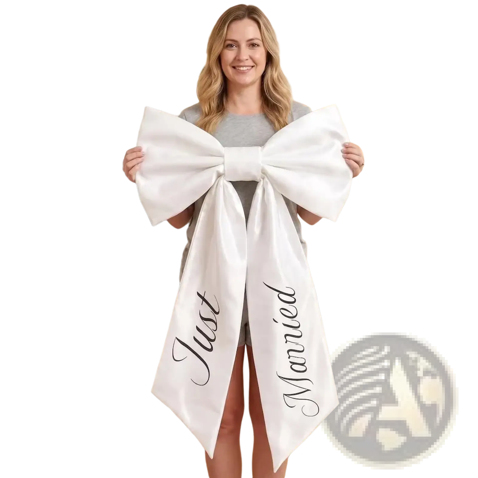 A large white satin just married car bow with black cursive script on each tail for wedding decoration