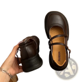 Dark brown leather mary jane chunky platform shoes with thick sole and adjustable ankle strap for stylish wear