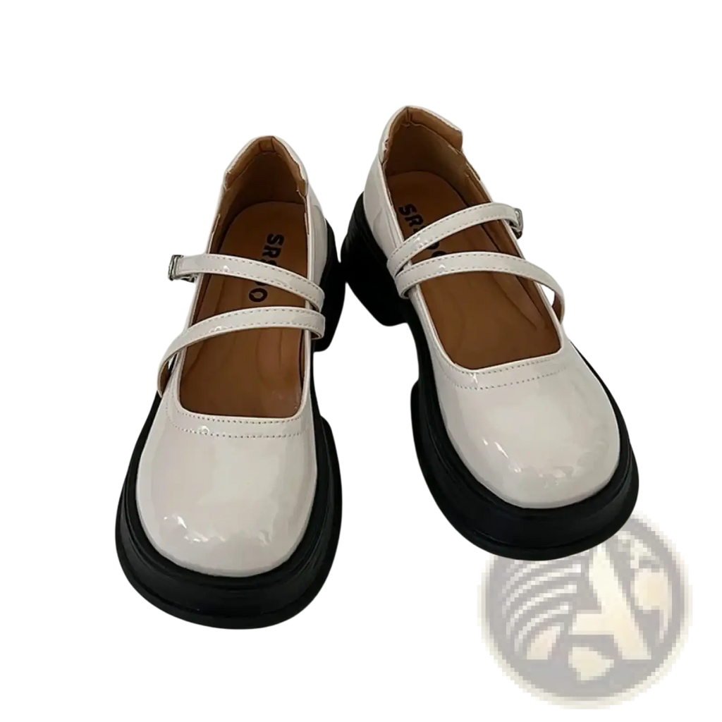 White patent leather mary jane chunky platform shoes with black soles and silver buckle straps for stylish wear