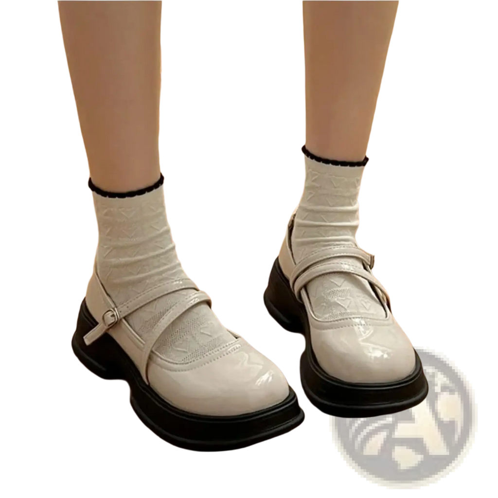 White patent leather mary jane chunky platform shoes with black soles and subtle embossed pattern