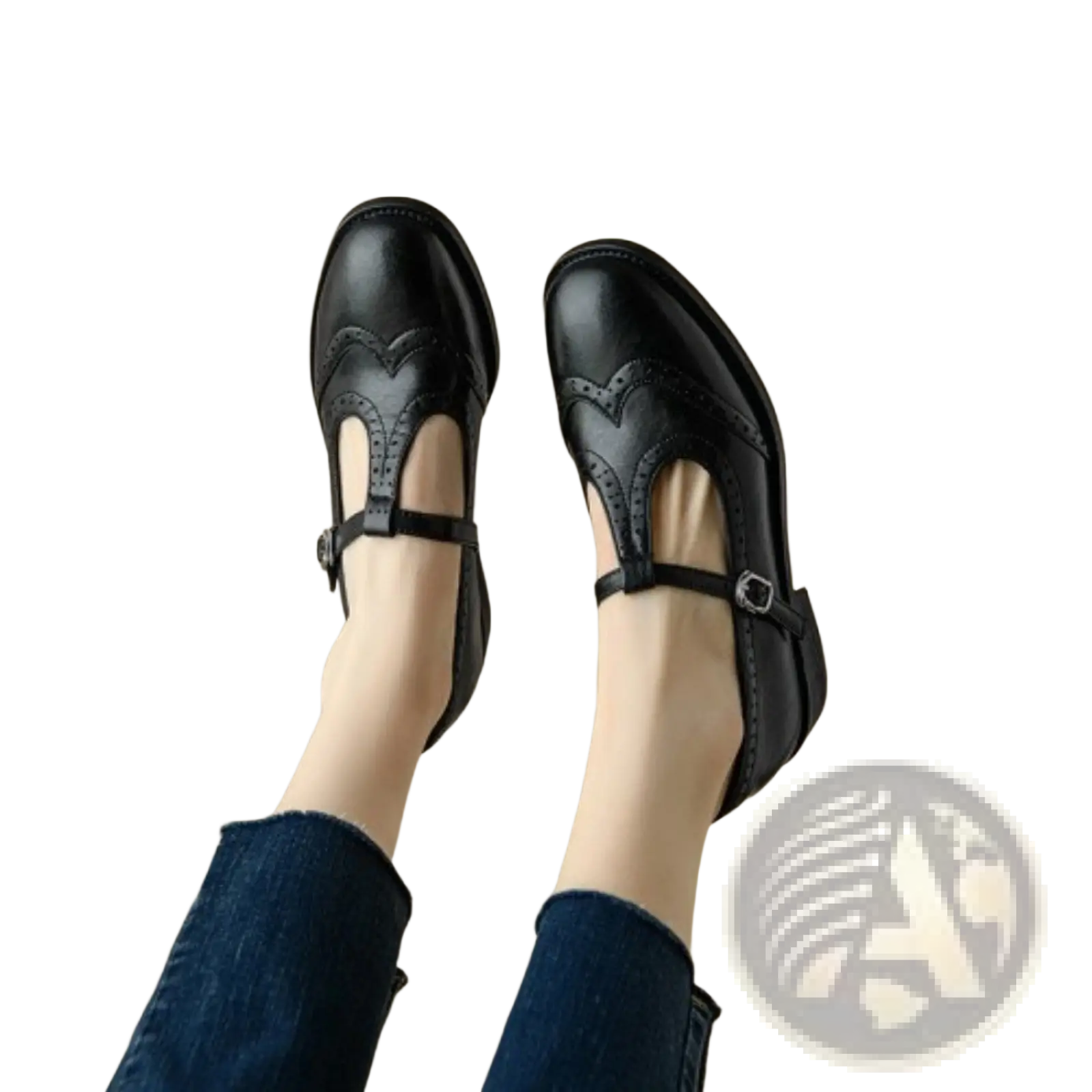 Black leather mary jane shoes with t strap brogue detailing and velvet lining in retro style